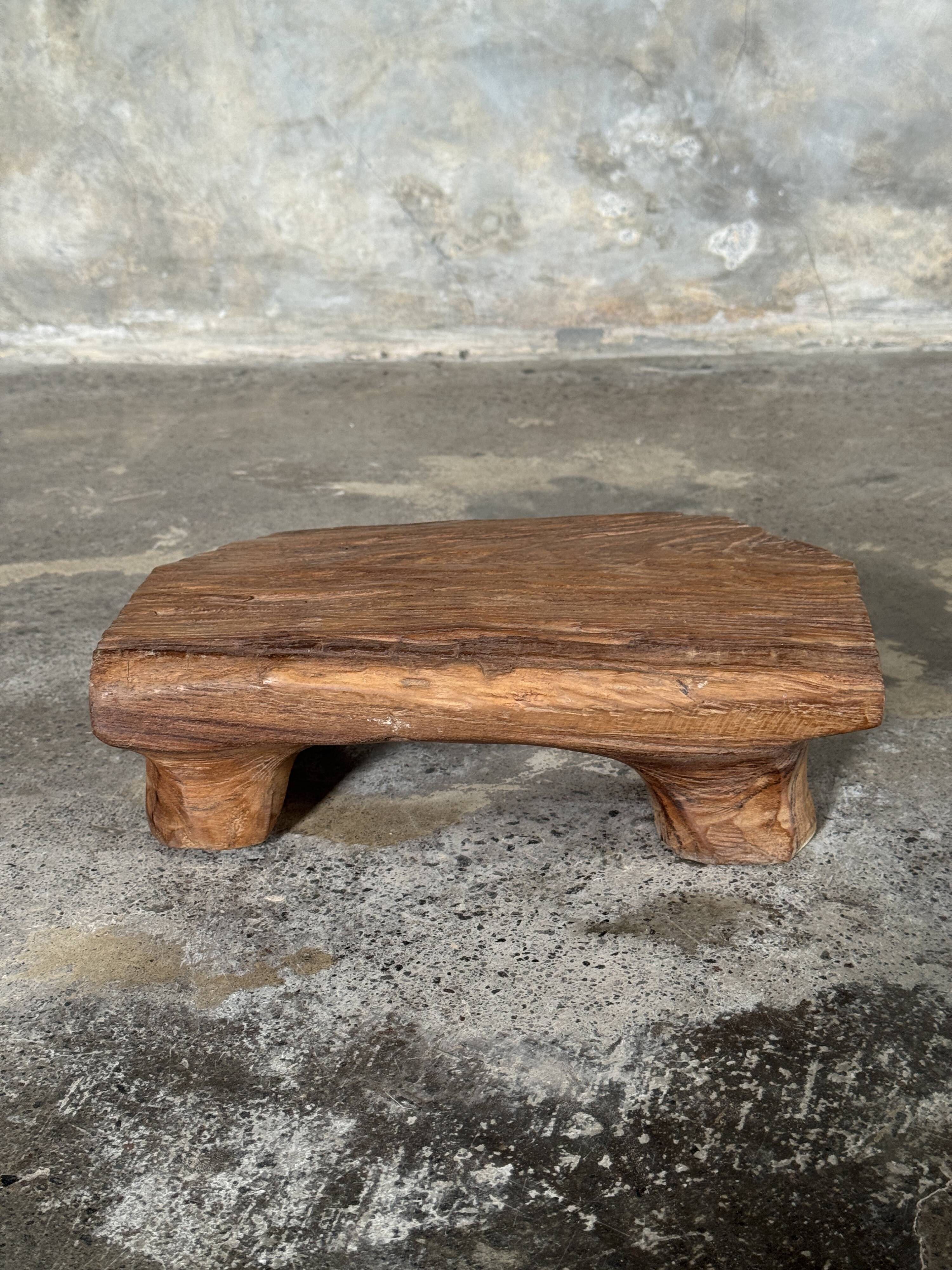 Small stool, teak footrest with short cut corners.