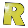 Yellow and black industrial sign "R" letter