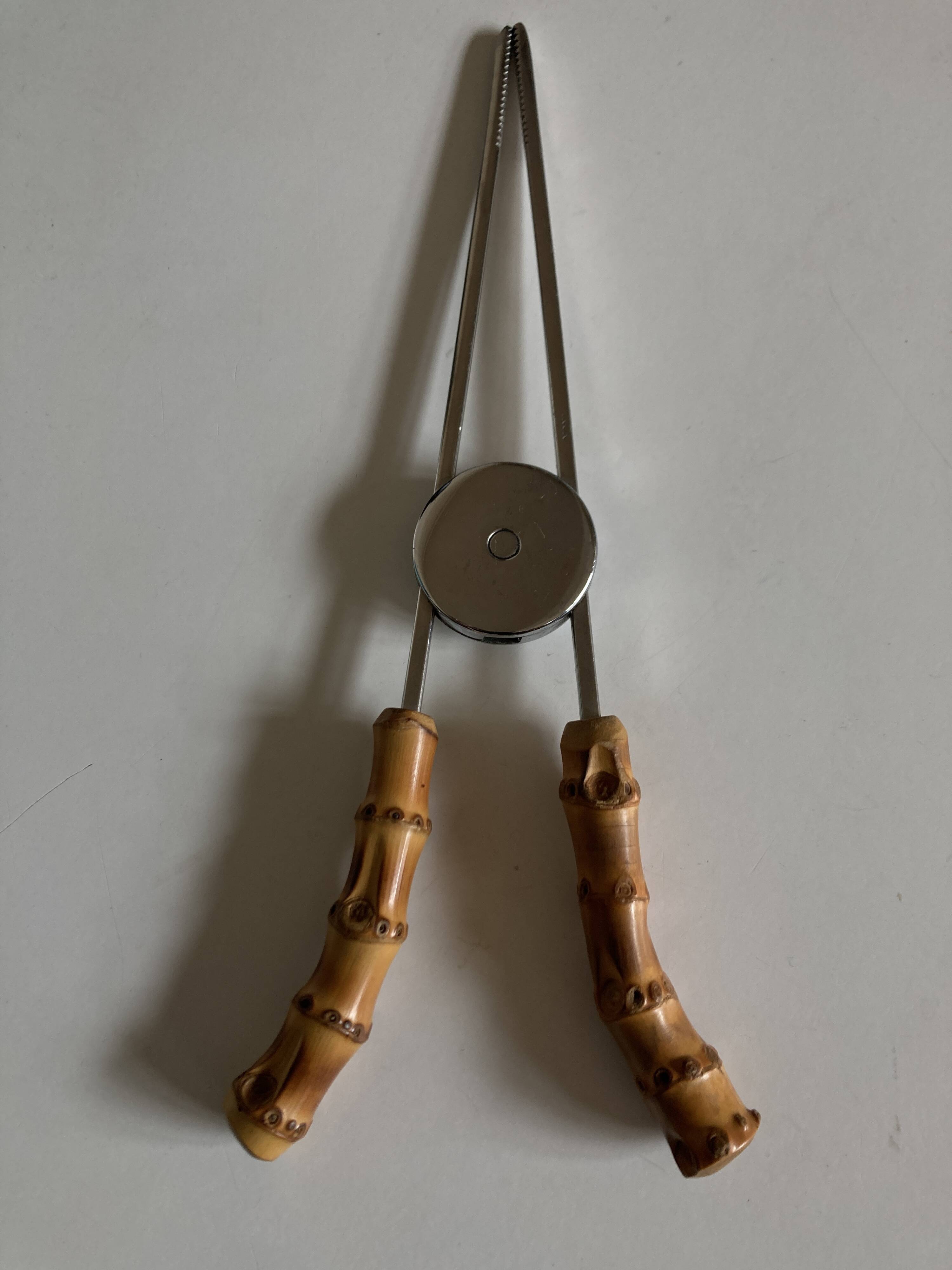 1960 dlg Adnet steel and bamboo ice tongs