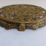 Worked copper trivet