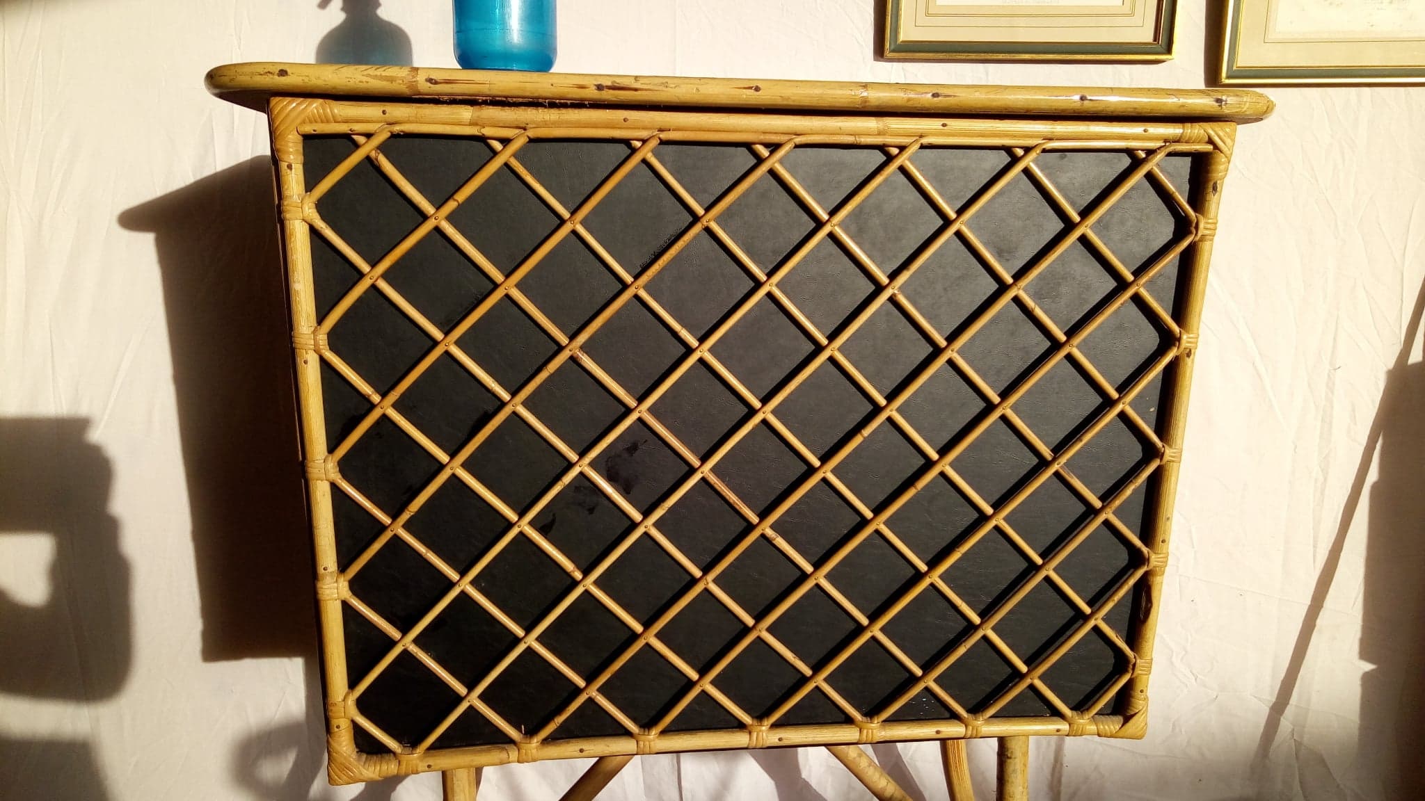 Bar in rattan, bamboo and faux black leather