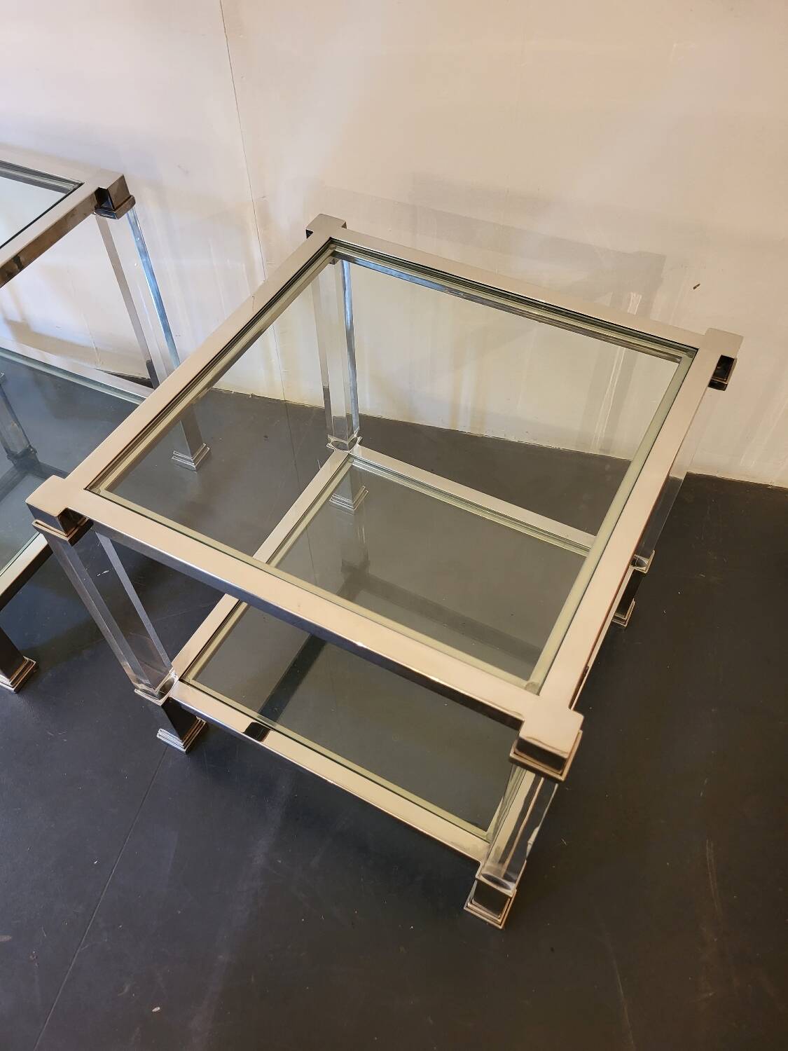 Paire de bouts de canapé en laiton chromé