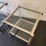 Pair of chrome-plated brass sofa ends