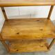Scandinavian rectangular shelf from the 1960s, made of solid pine with round pencil legs.
