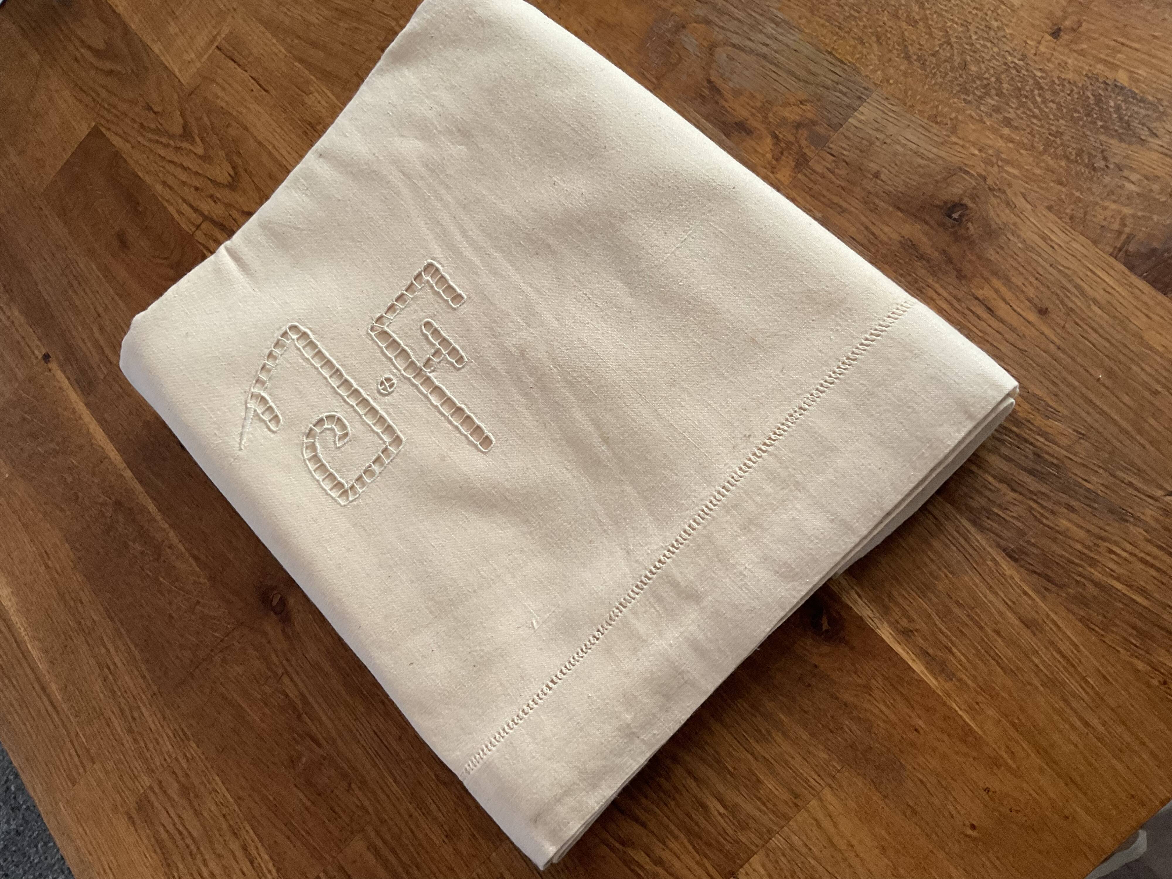 Old embroidered sheet monogram