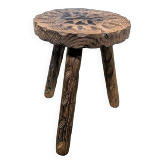 Carved wooden tripod stool