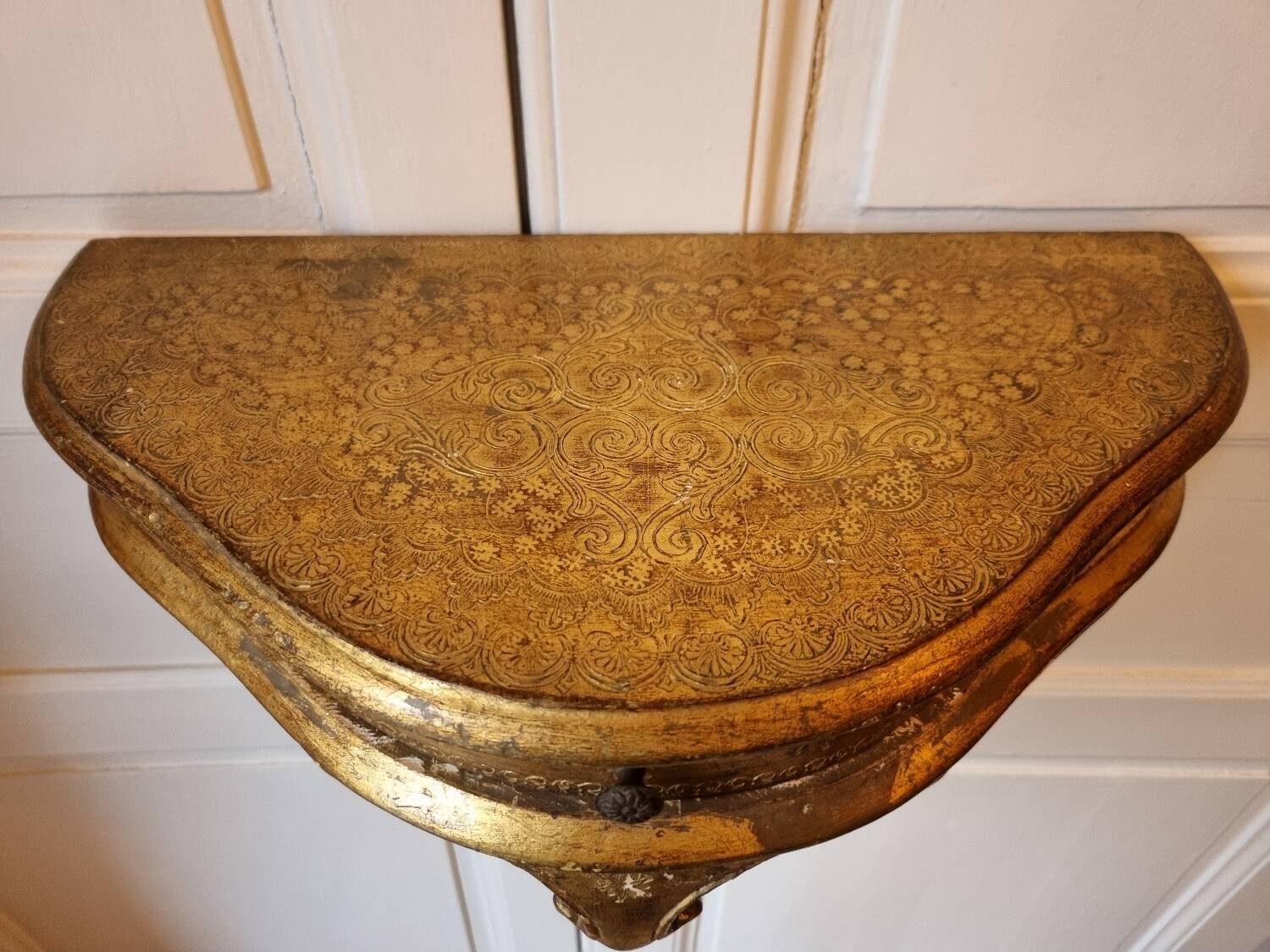 Mid-19th century wall console in wood and gilded stucco