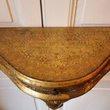Mid-19th century wall console in wood and gilded stucco