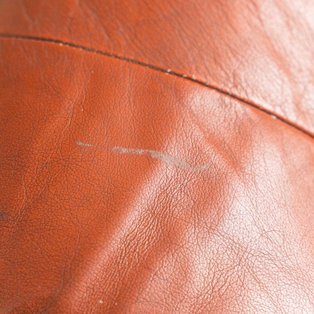COPPIA DI POLTRONE VINTAGE IN PELLE ARANCIO ANNI ’70 MODERNARIATO