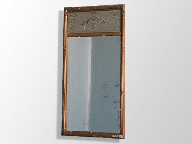 Louis XVI style in Golden stucco trumeau