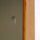 Wooden wall shelf with sliding mirror doors, 1970s