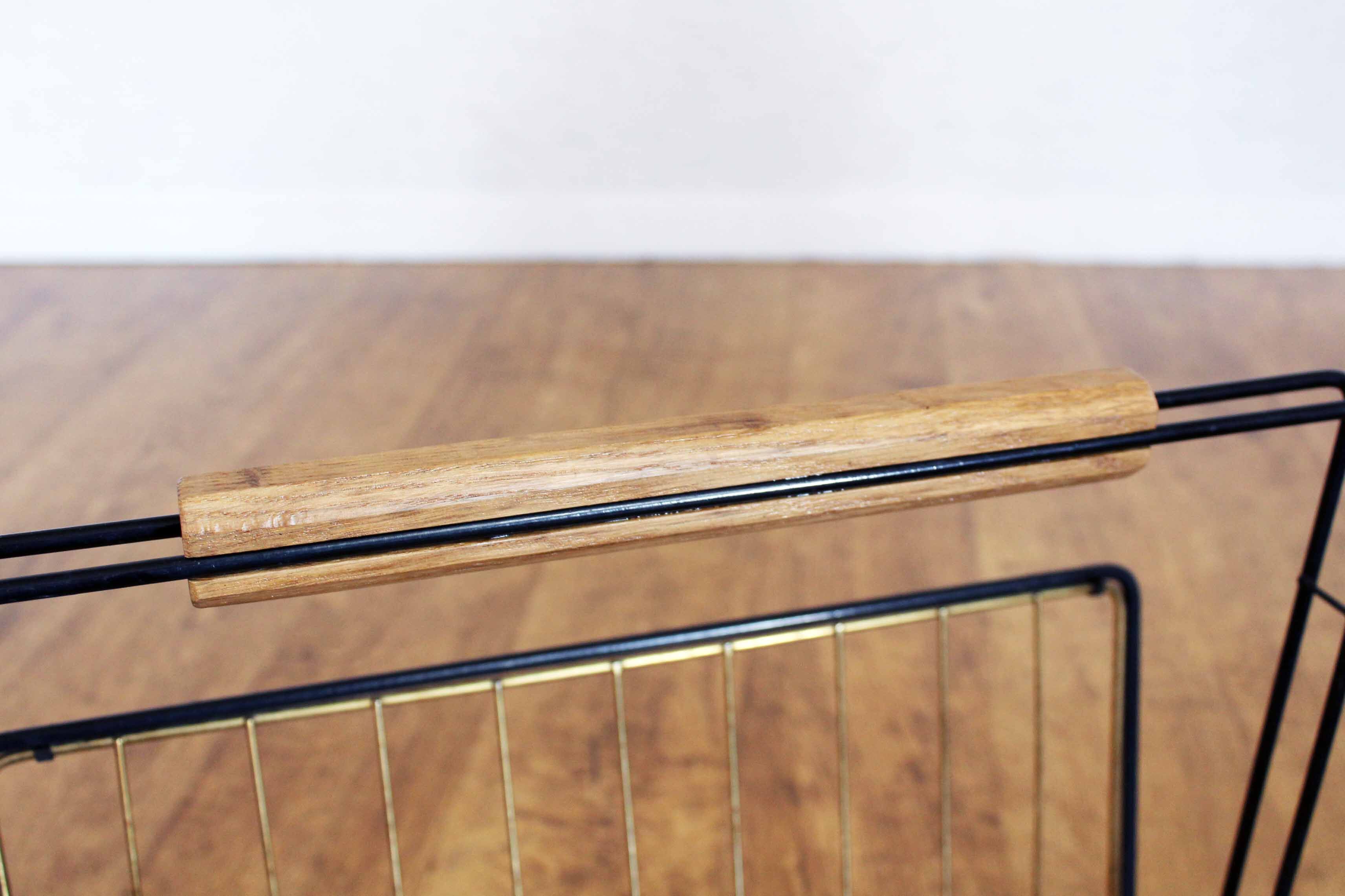 Metal magazine rack, wooden handle
