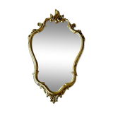 Old baroque style wall mirror with golden moldings