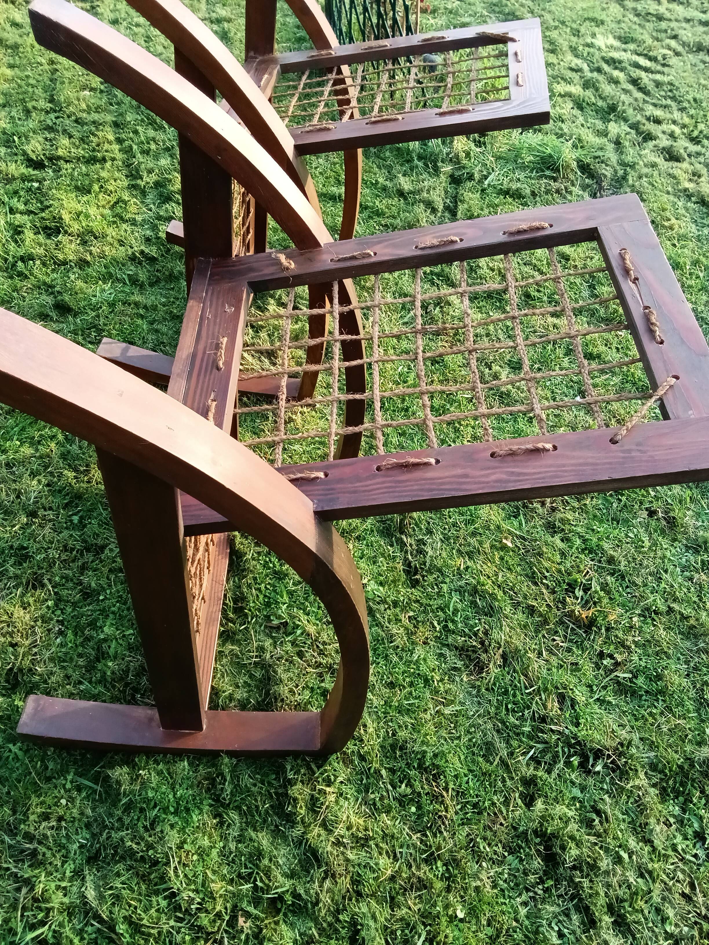 A pair of vintage rope and wood armchairs