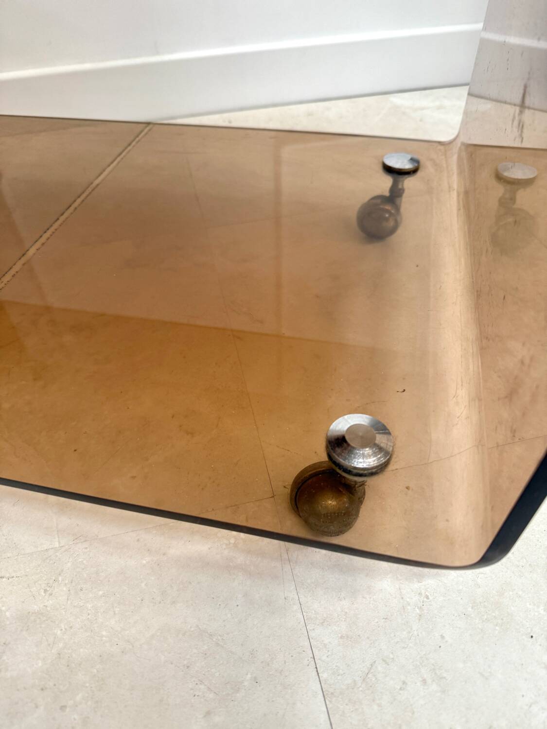 Smoked plexiglass coffee table