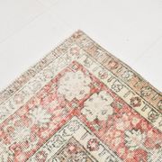 Tapis persan vintage à motif floral