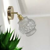 Gold wall light with bubble glass