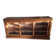 Antique wooden sideboard with three sliding glass doors.