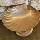 Large brass shell-shaped pocket emptier