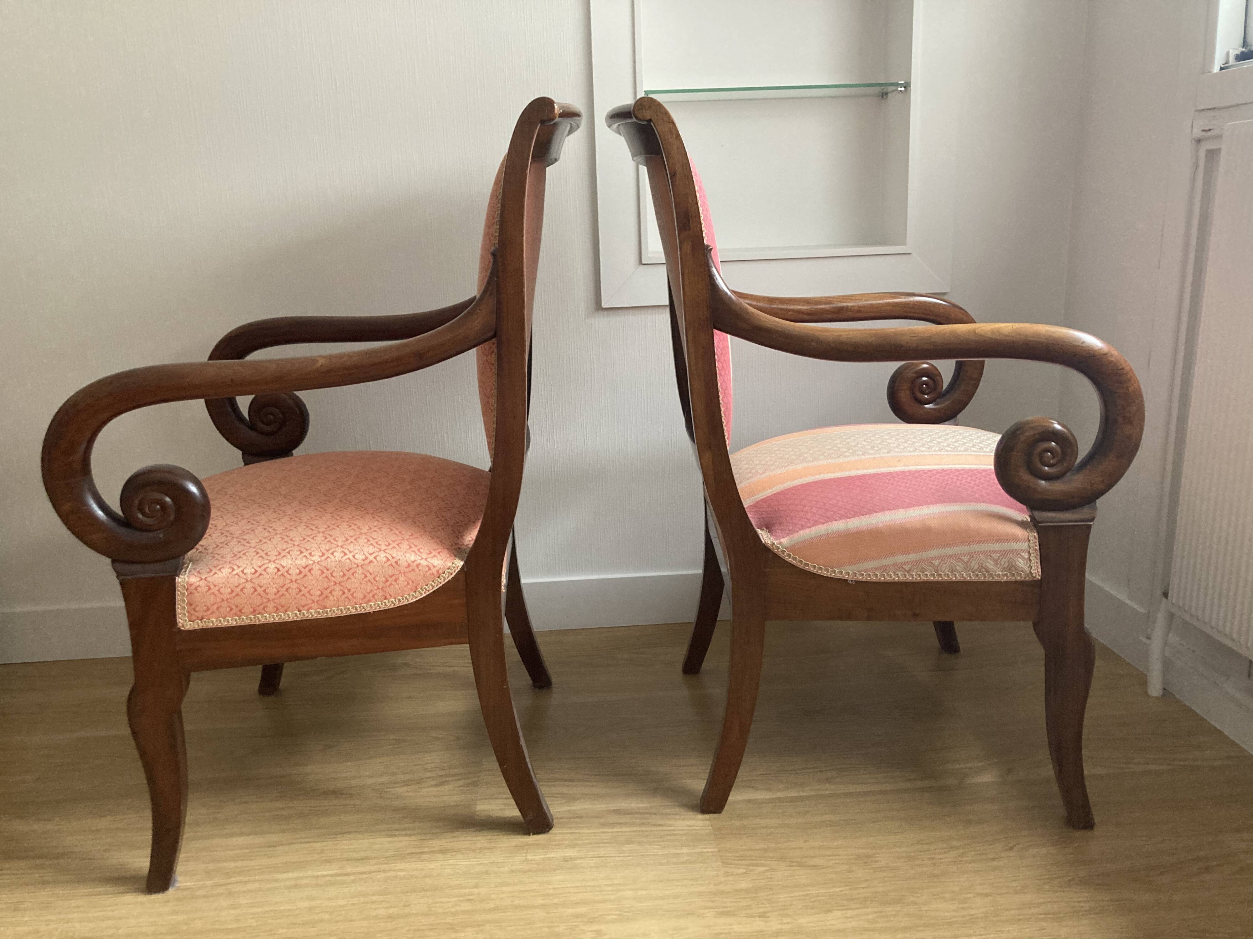 Pair of Restoration style armchairs with curved arms and cabriole legs
