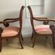 Pair of Restoration style armchairs with curved arms and cabriole legs