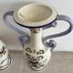 Baluster vase with handles in porcelain with floral decoration.