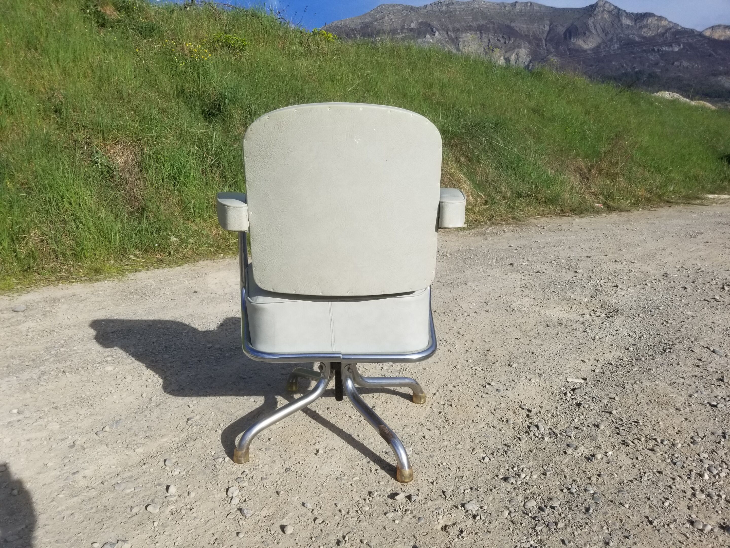 Old light grey pullman swivel office chair