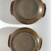 2 Handcrafted green-brown stoneware bowls signed