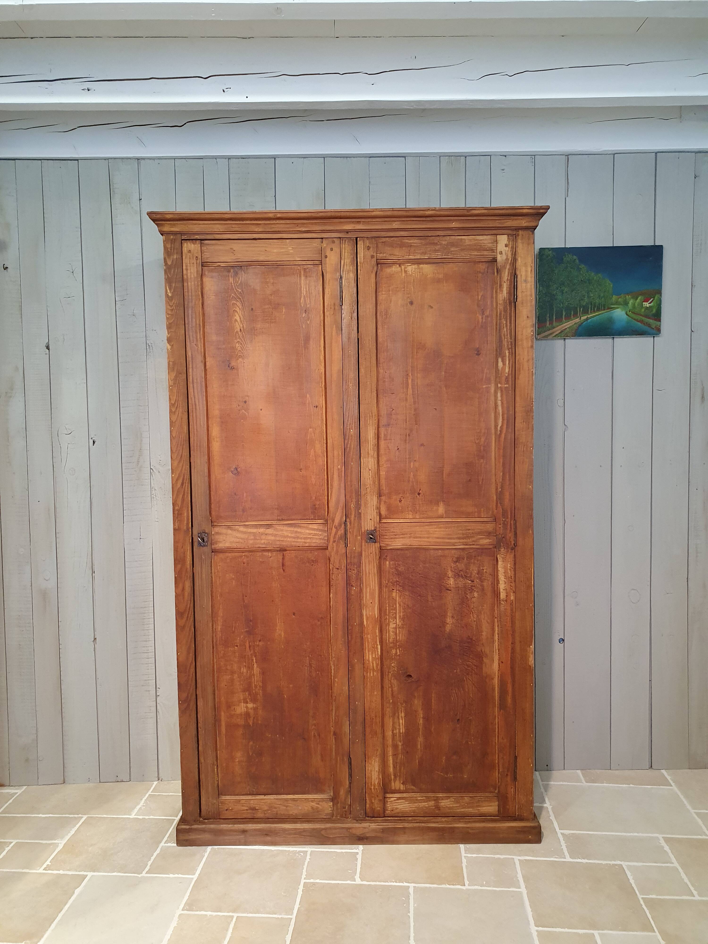Parisian wardrobe in raw wood