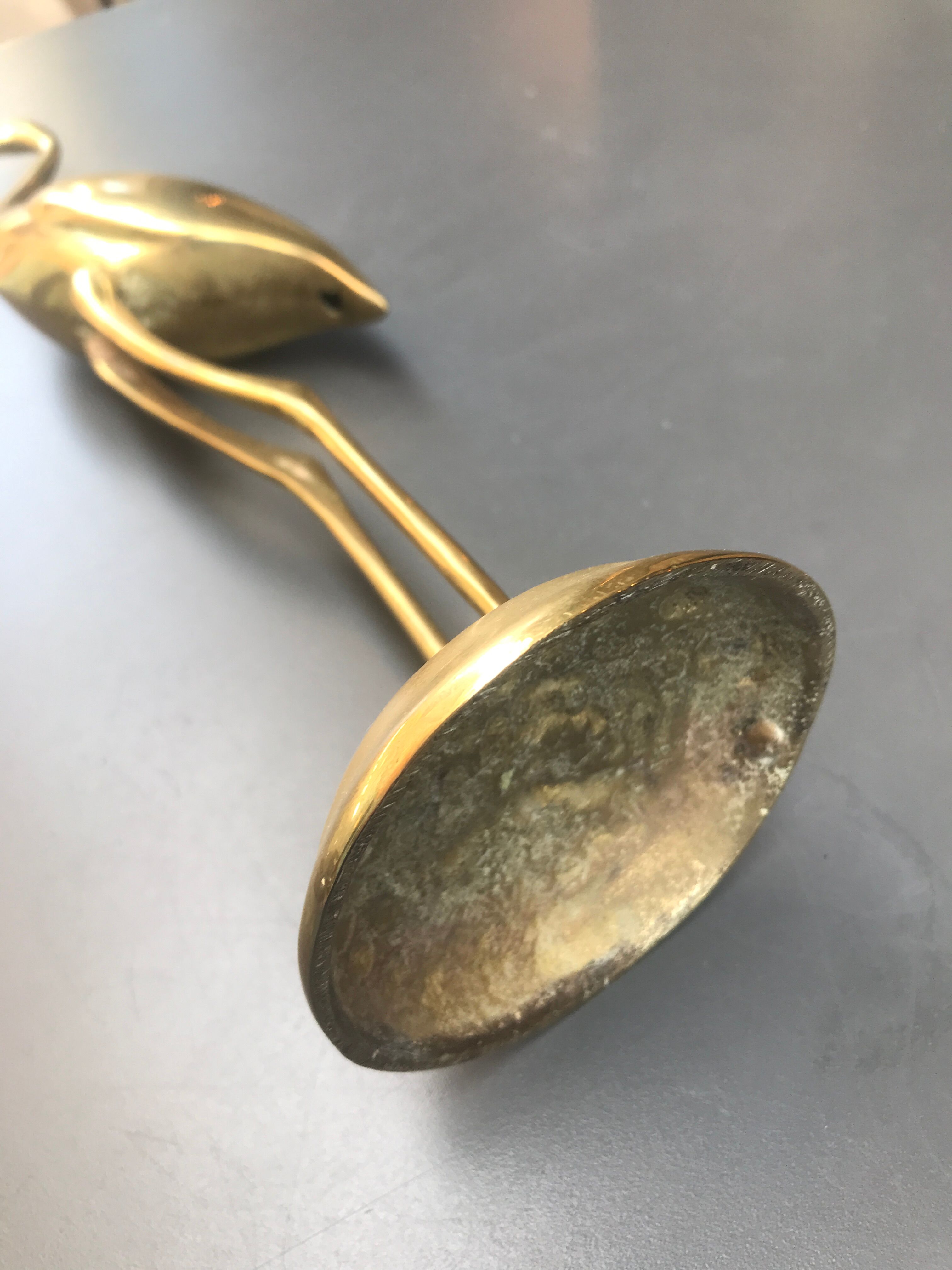 Large brass stilt walker