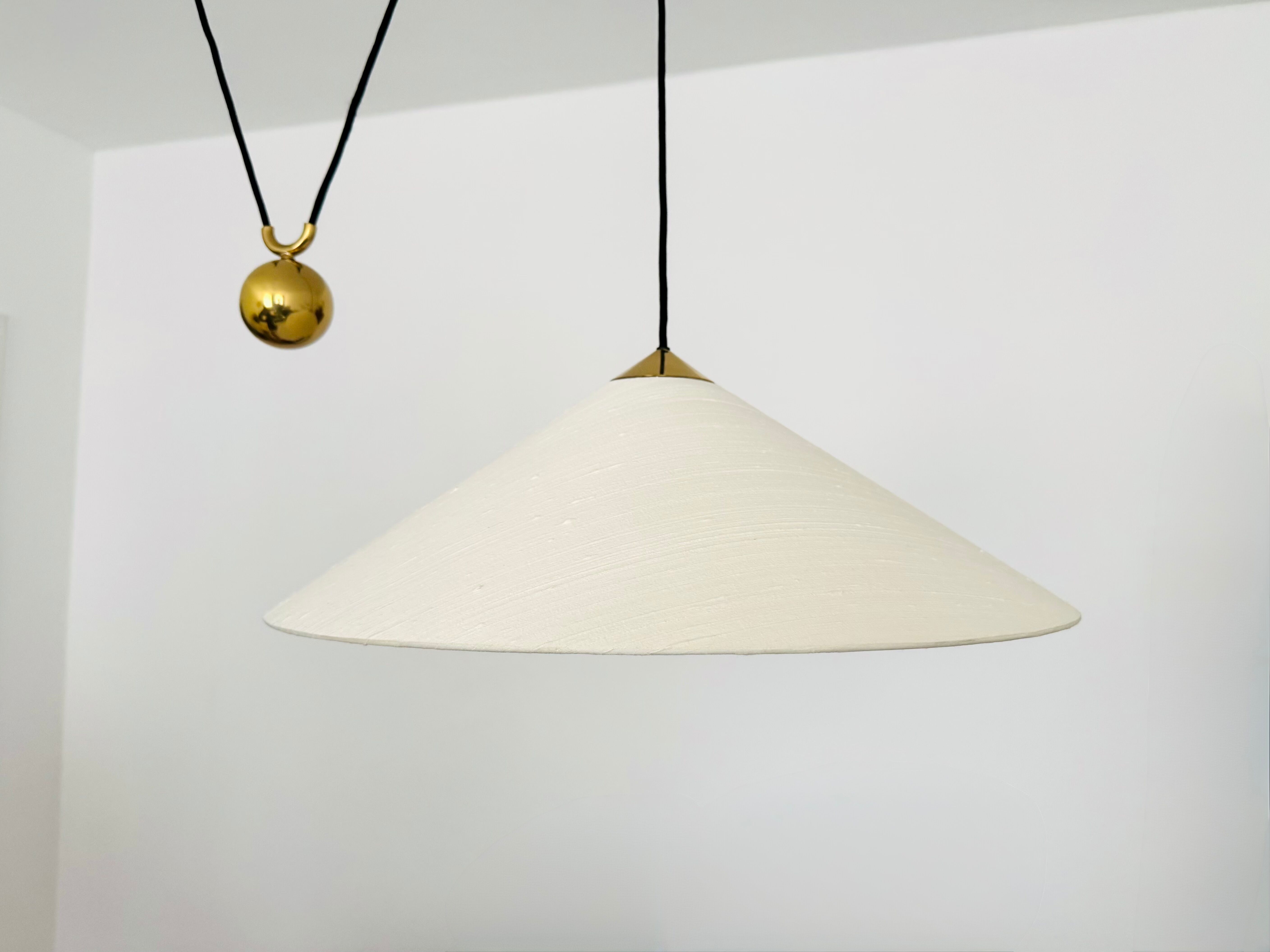 Large Adjustable Brass Pendant Lamp with Counterweight by Florian Schulz