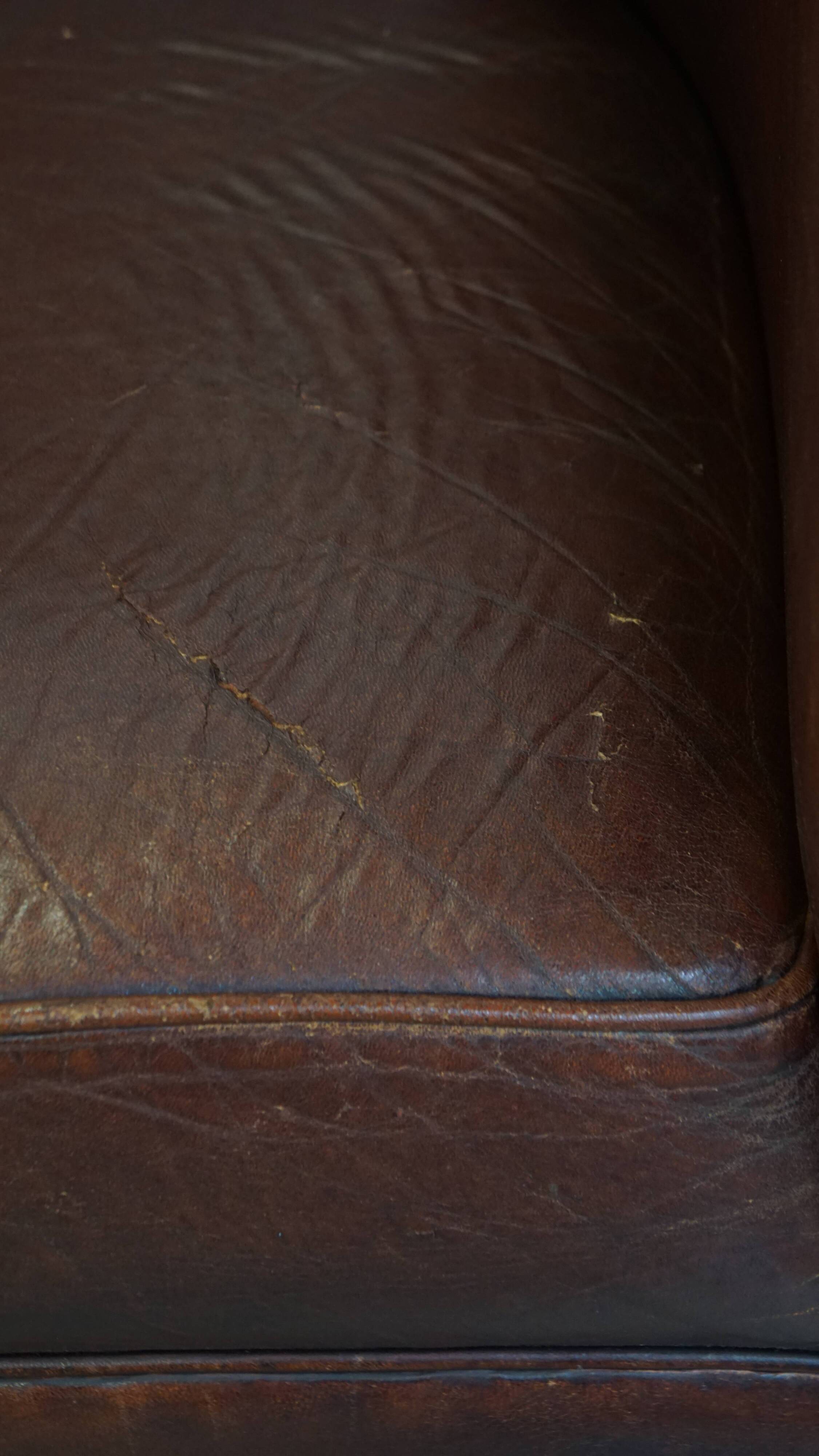 English style sheepskin club chair with a beautiful patina