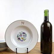 6 deep plates made of Limoges porcelain with a paradise bird design.