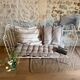 Small renovated wrought iron bed