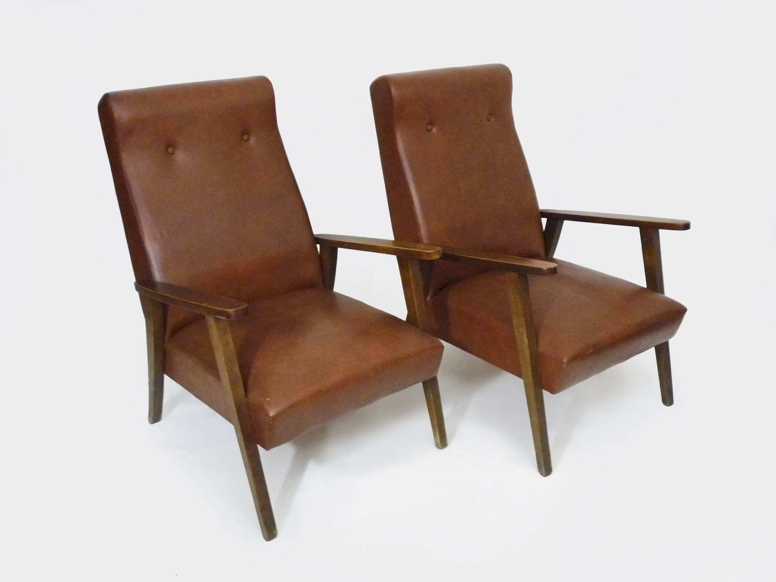 Pair of Scandinavian armchairs in brown leatherette and wood from the 50s and 60s
