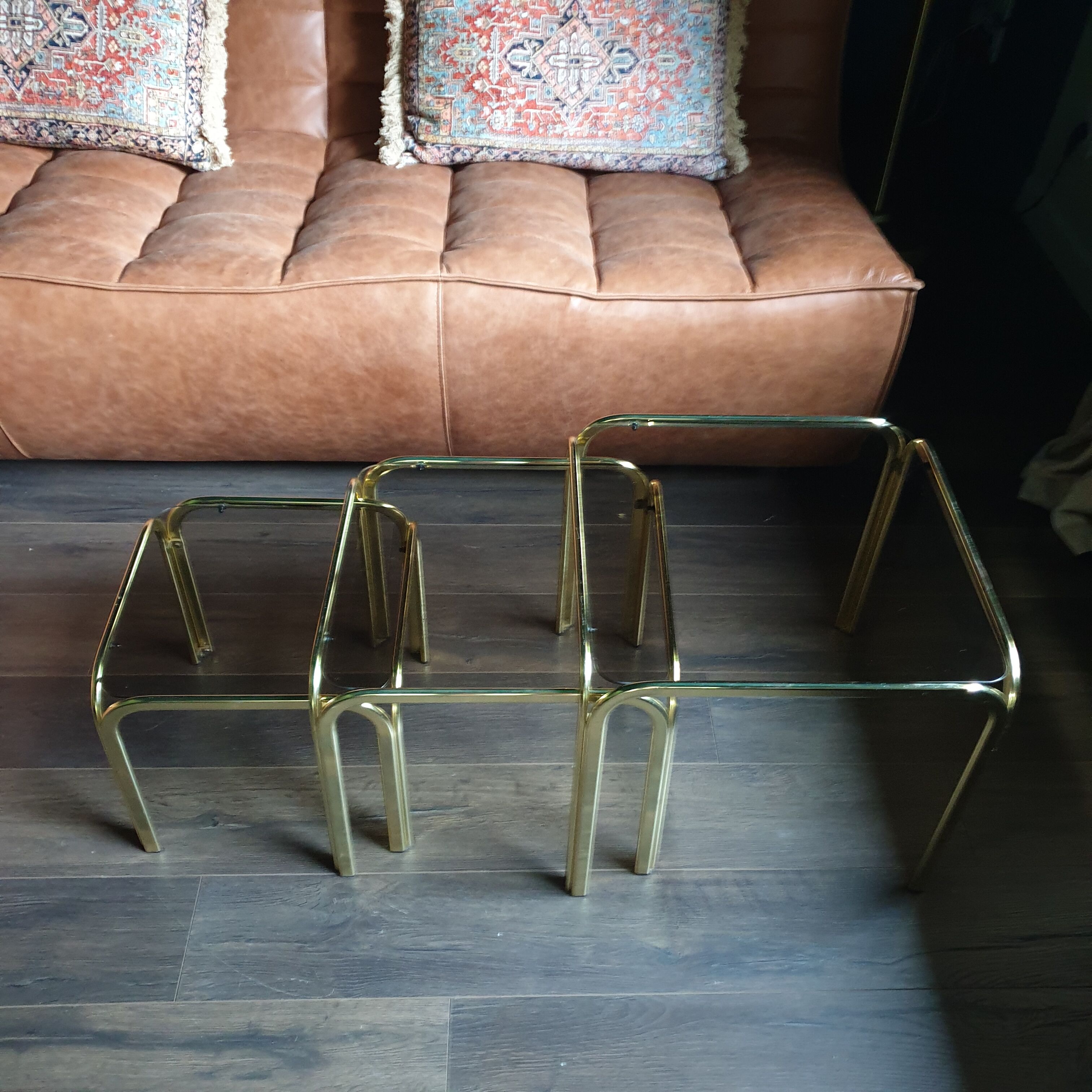 Golden vintage pull-out coffee tables and 70s smoked glass