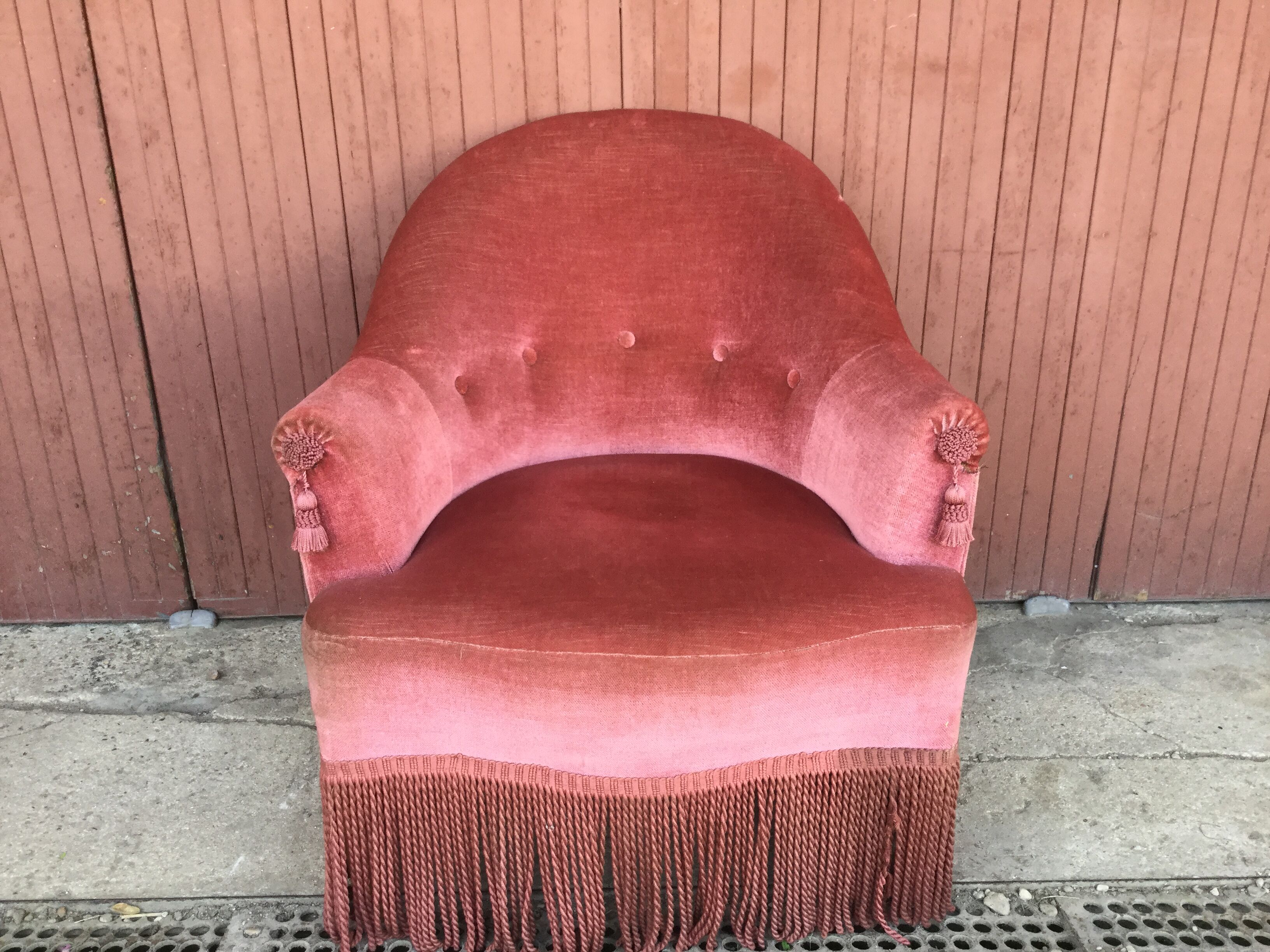 Pink velvet armchair
