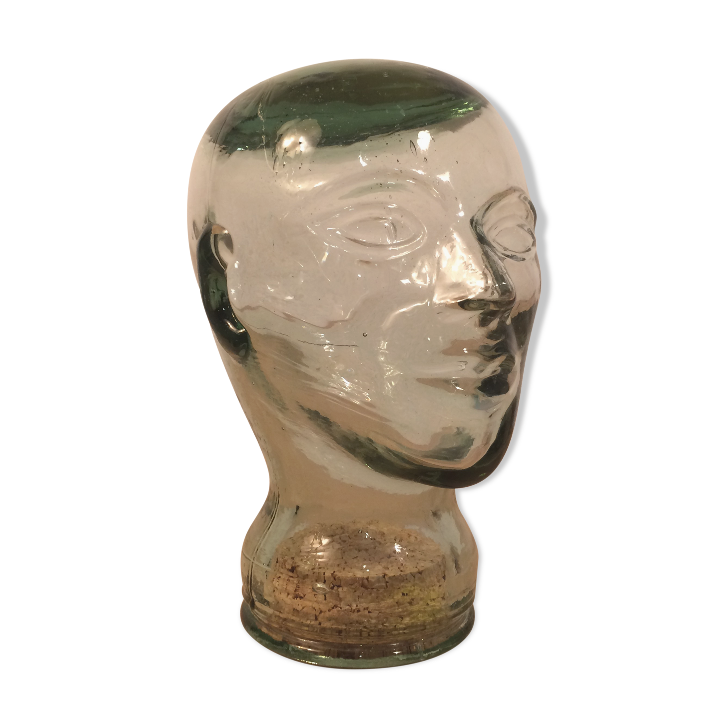 Molded glass head curiosity cabinet