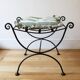 pair of wrought iron stools with cushions