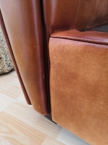 Tawny vintage leather club chair