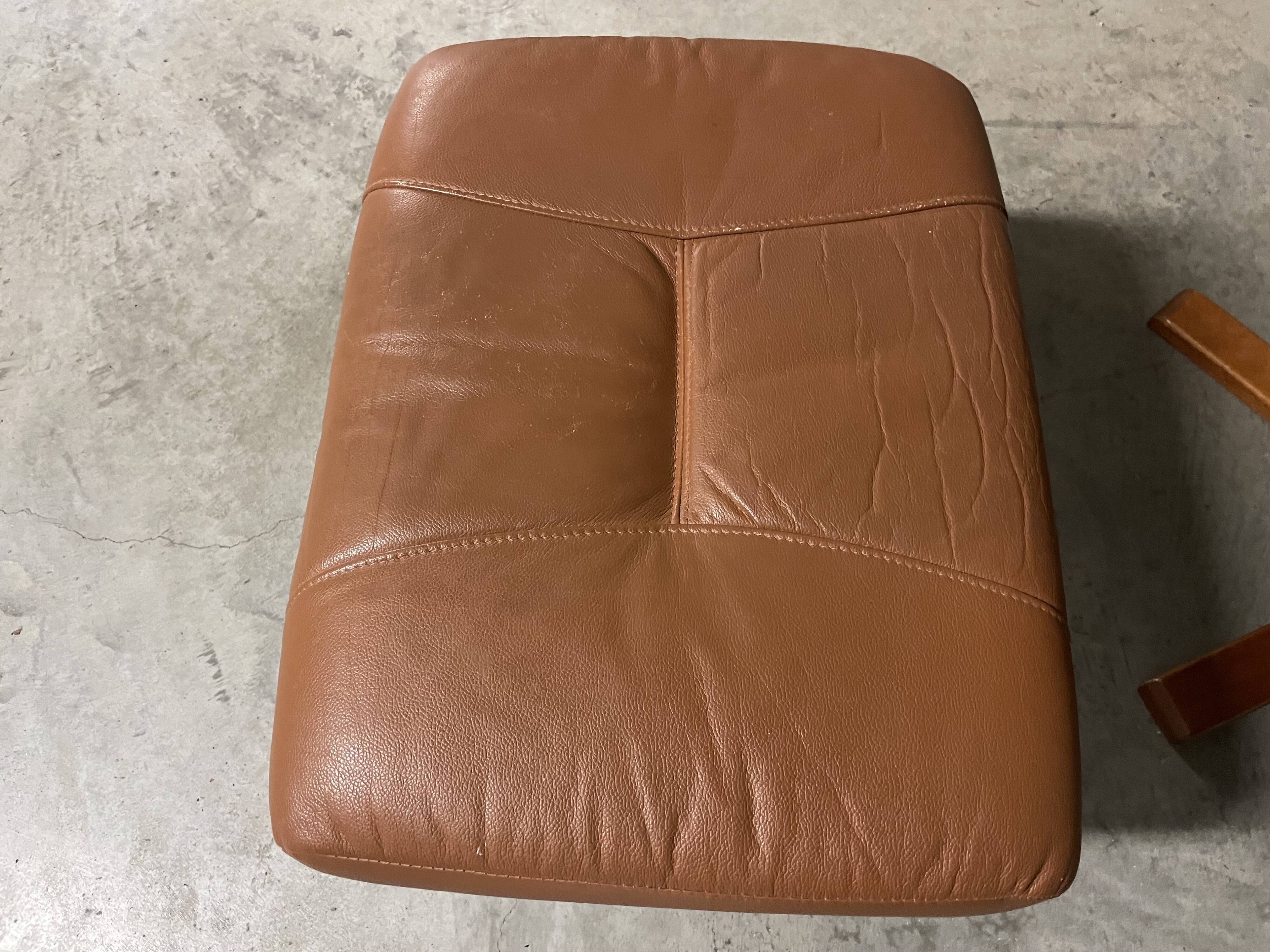 Unico leather armchair and ottoman