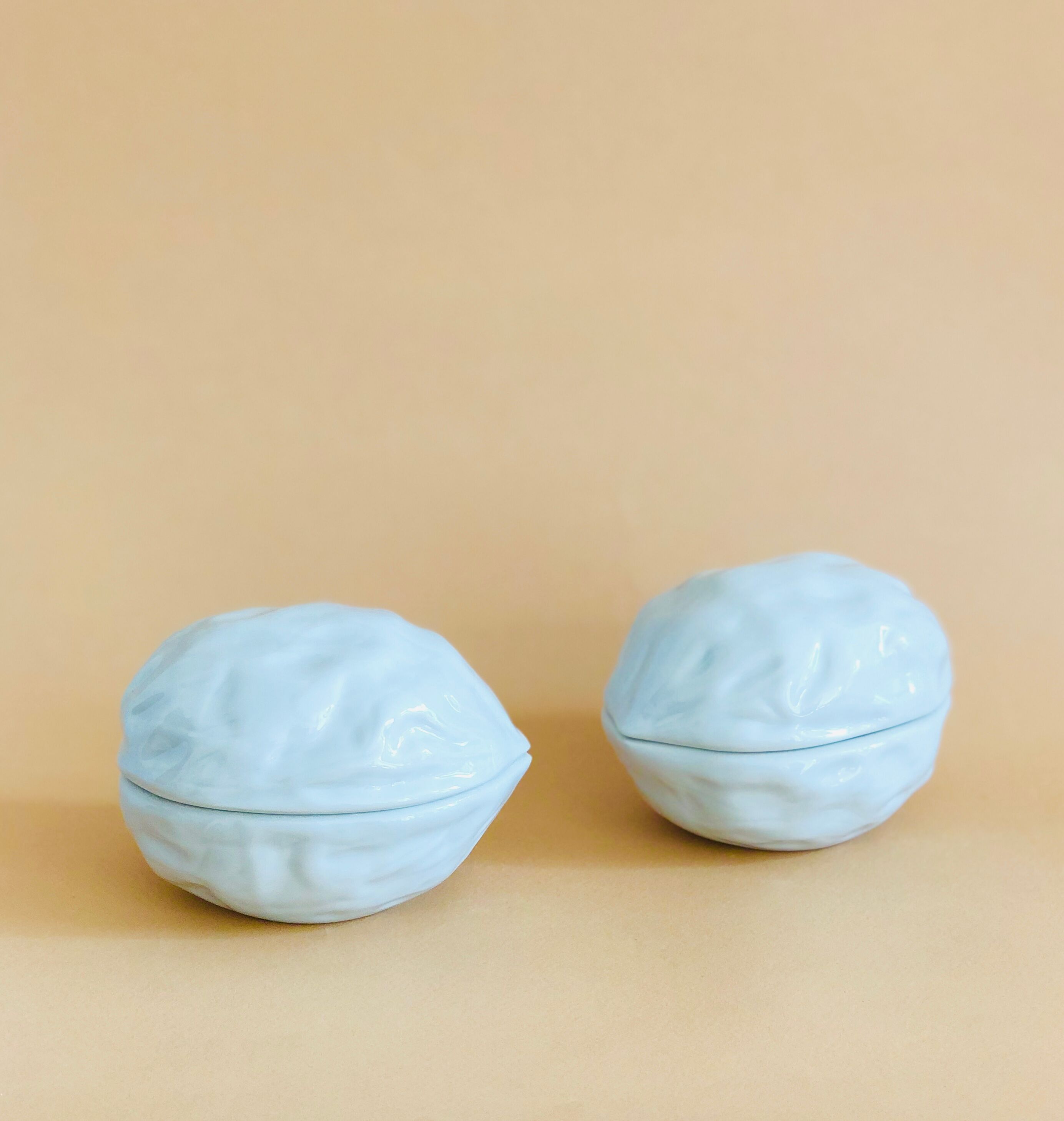 Pair of Limoges porcelain nut boxes