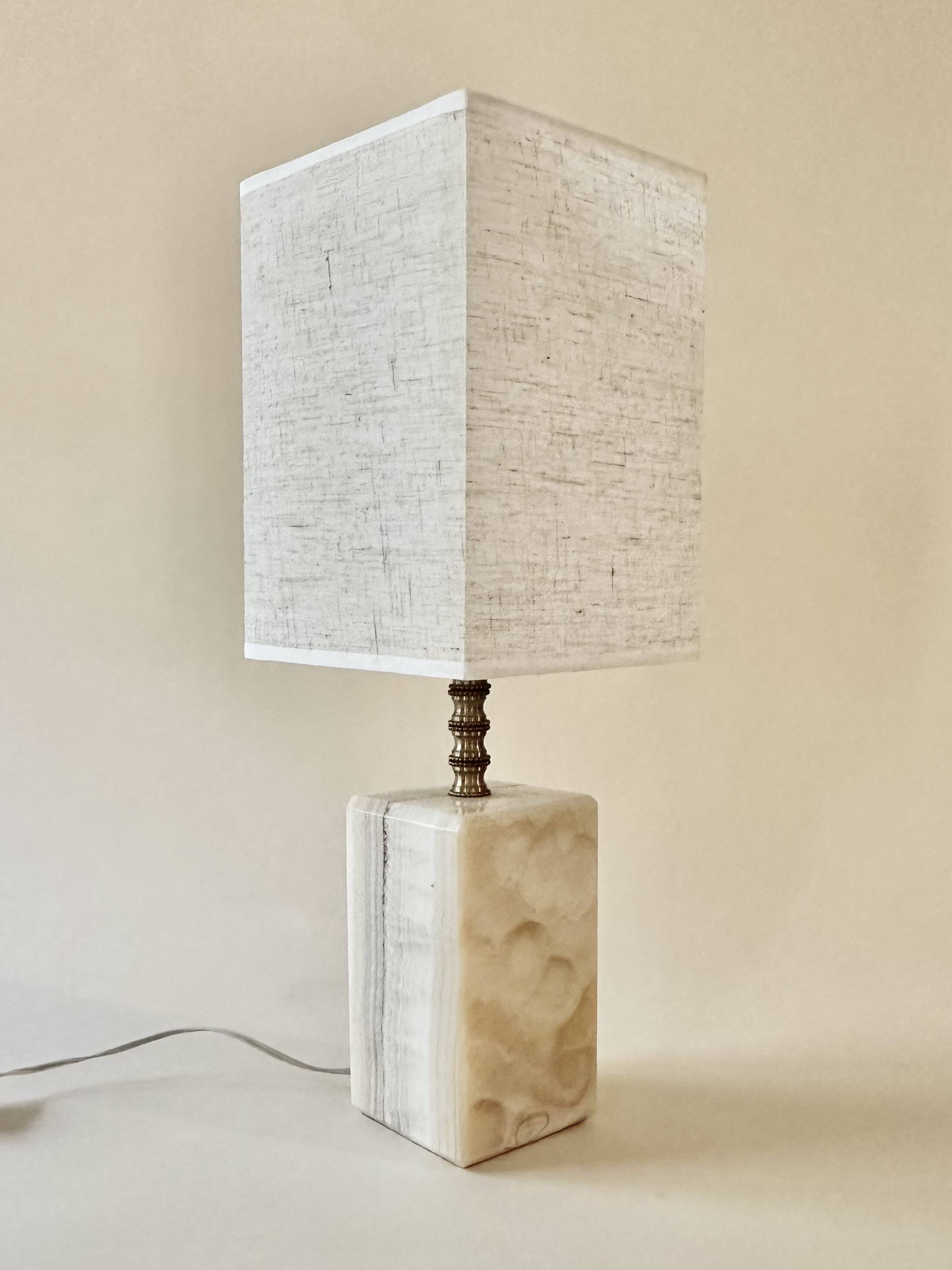 Onyx and brass lamp with a square shade.