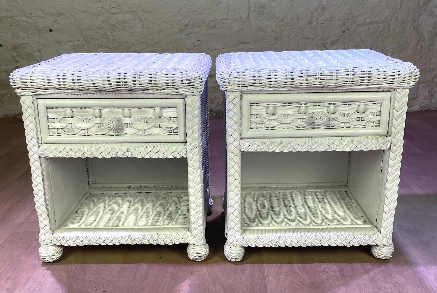 Pair of white lacquered rattan bedside tables
