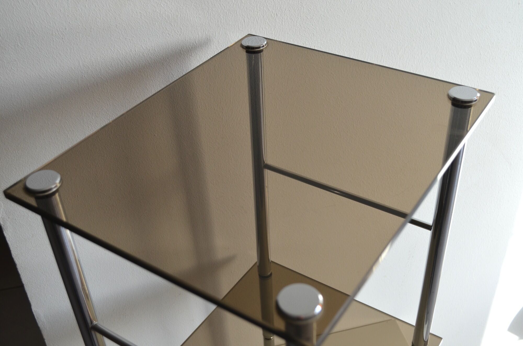 Side table in chrome and smoked glass