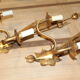 Golden floral wall lamps