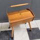 Sewing box on legs and wheels