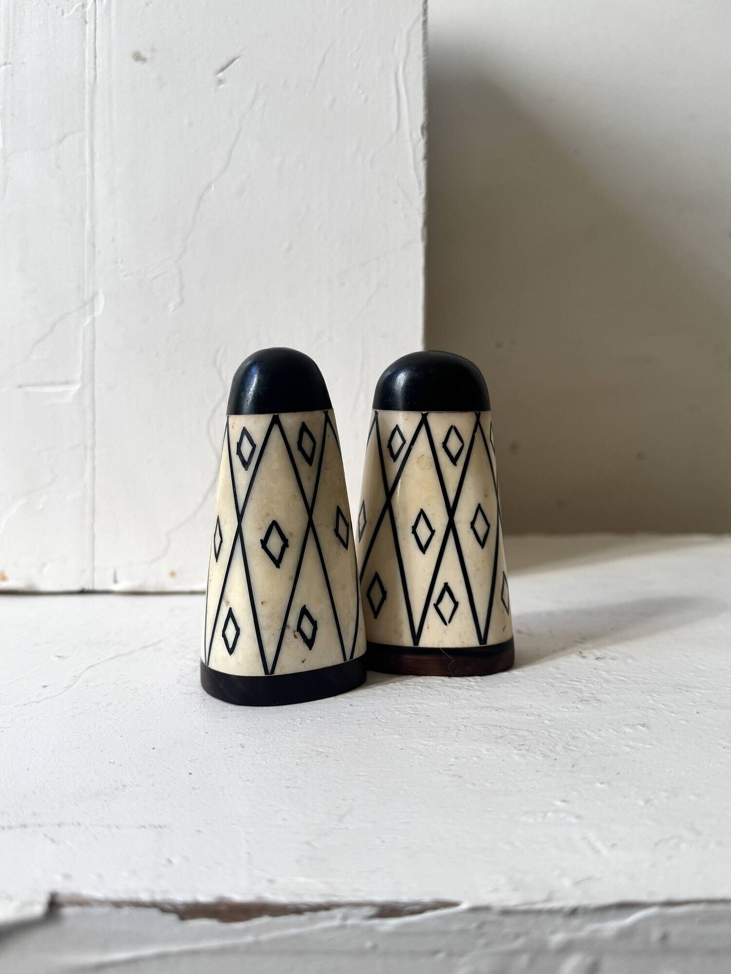 Art Deco salt and pepper set in ebony and ivory circa 1950