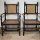 Paire de fauteuils canneés style Louis XIII anciens