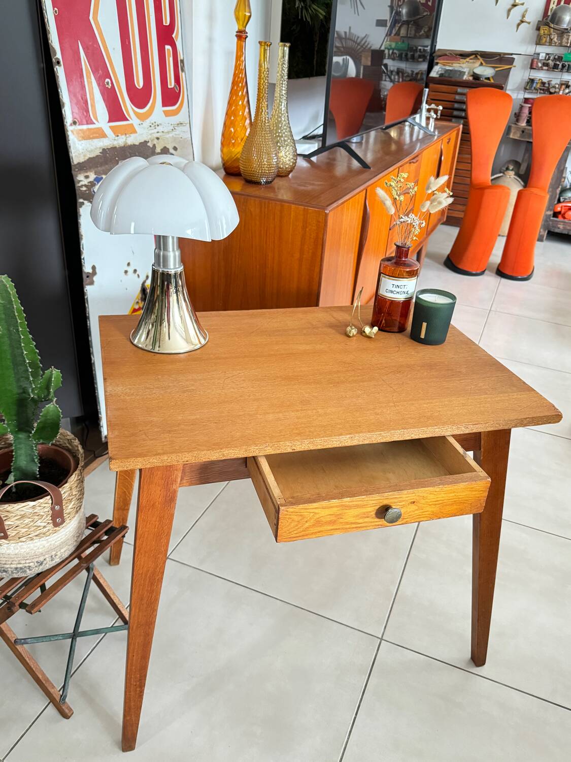 Old wooden desk or side table with compass legs